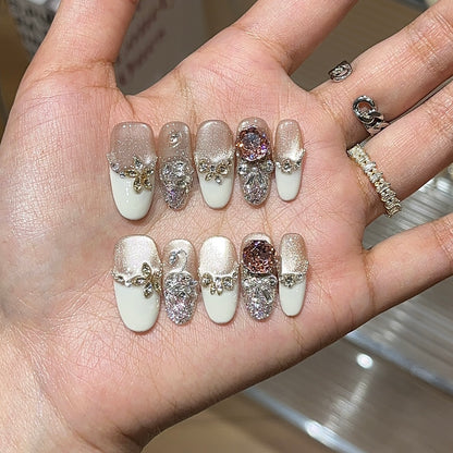 Creamy rose press-on nails with soft pink rose-inspired details
