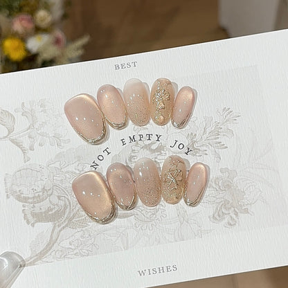 Delicate verse press-on nails with soft blue tones and elegant nail art
