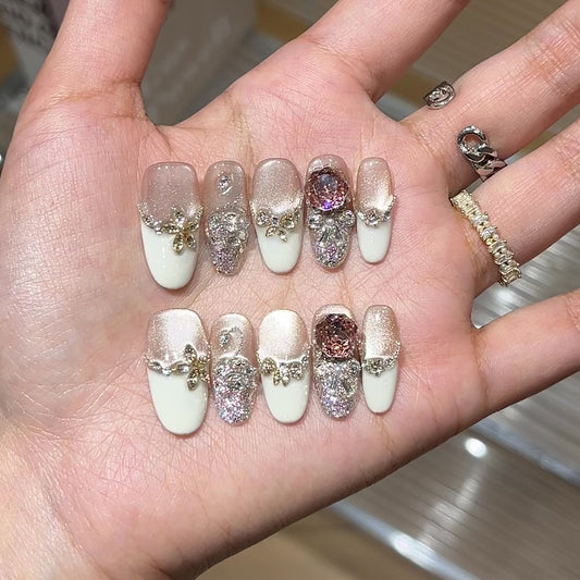 Creamy rose press-on nails with soft pink rose-inspired details